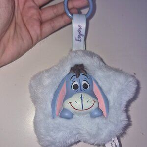 MINISO Disney Fluffy Flowers Series Eeyore plush pendant toy.